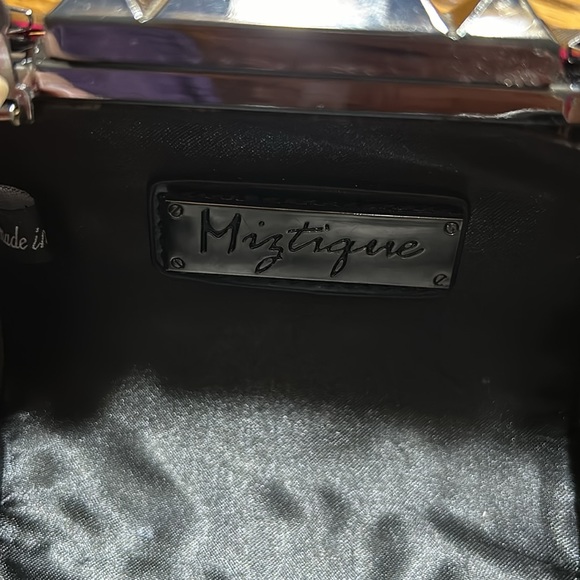 Mystique pink bag and black evening bag.  Both have chain straps. - Picture 2 of 9